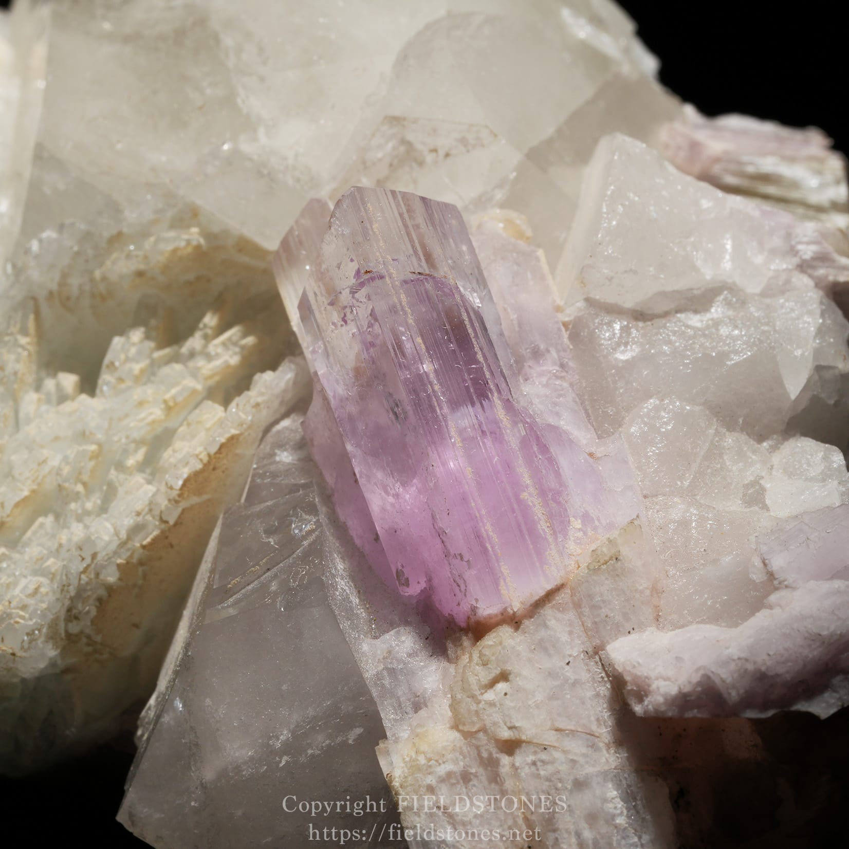 6725-10 - FieldStones Lavender amethyst crystal growing from white quartz in a mineral cluster.